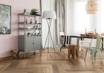 Timber flooring is back with a vengeance, and so too is the classic elegance of a herringbone installation!

Herringbone installations have been known to create an eclectic feel, giving the illusion of space, and creating a directional flow that can direct the eye to any key pieces of your interior design. 

This style of installation, as well the variety of colours and styles that timber flooring is available in are also incredibly versatile, fitting with various design styles such as Hampton, French, Country, Scandi, and many more.

Although, while engineered timber planks are a tried-and-true flooring solution, many have taken hybrid flooring options in a stride with their affordability, ease of installation (especially when installed using the recommended Snappy® tool), easy maintenance, good impact and scratch resistance, and waterproof benefits.

And this is where our new UltraPet Hybrid Herringbone comes into play! With this fantastic range, you get the best of both worlds! 

UltraPet Hybrid Herringbone is a single-plank design with a revolutionary locking system. No more A’s and B’s, making the ordering and installation processes a simpler and more enjoyable experience.

A new level of elegant and timeless, yet contemporary, flooring. See for yourself at your nearest Carpet Court store!